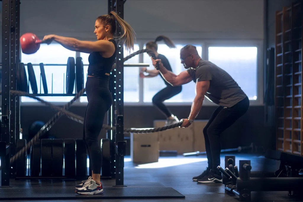 Kettlebell and battle rope strength training