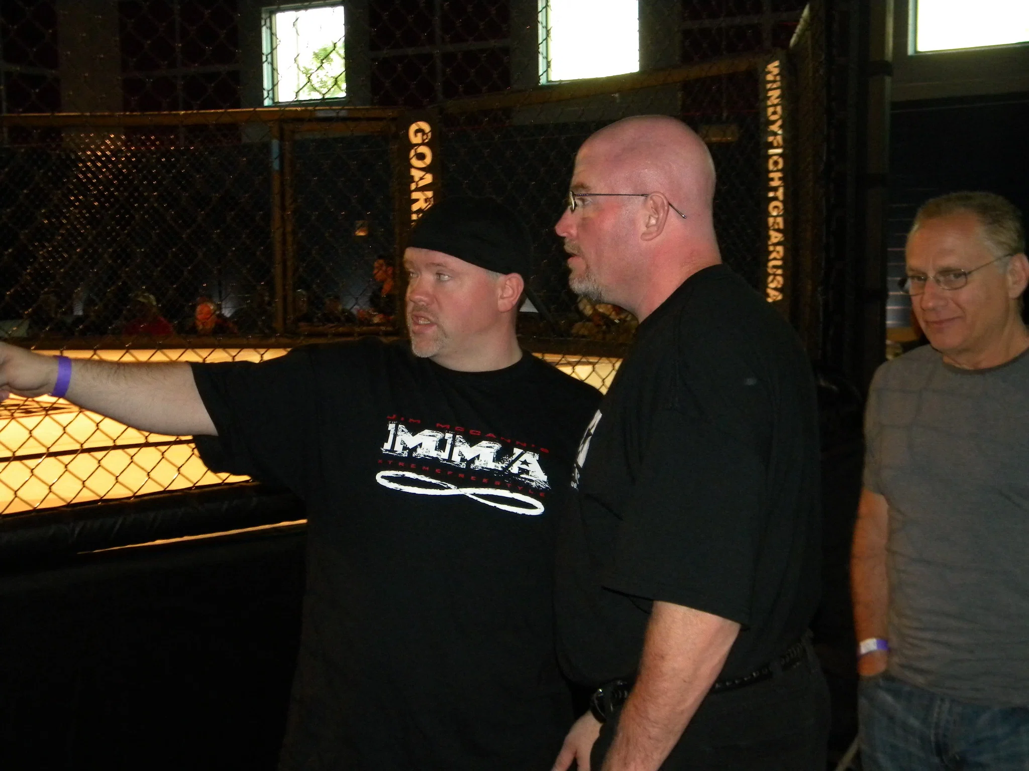 Jim McCann and Mick discussing event logistics behind the scenes