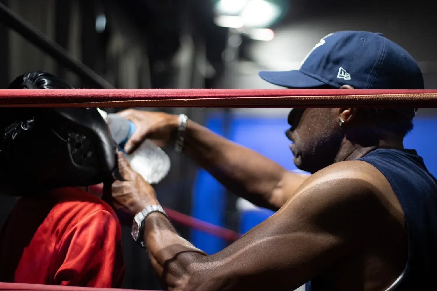 Coach Ron Harris working with a boxer at Primal Jym