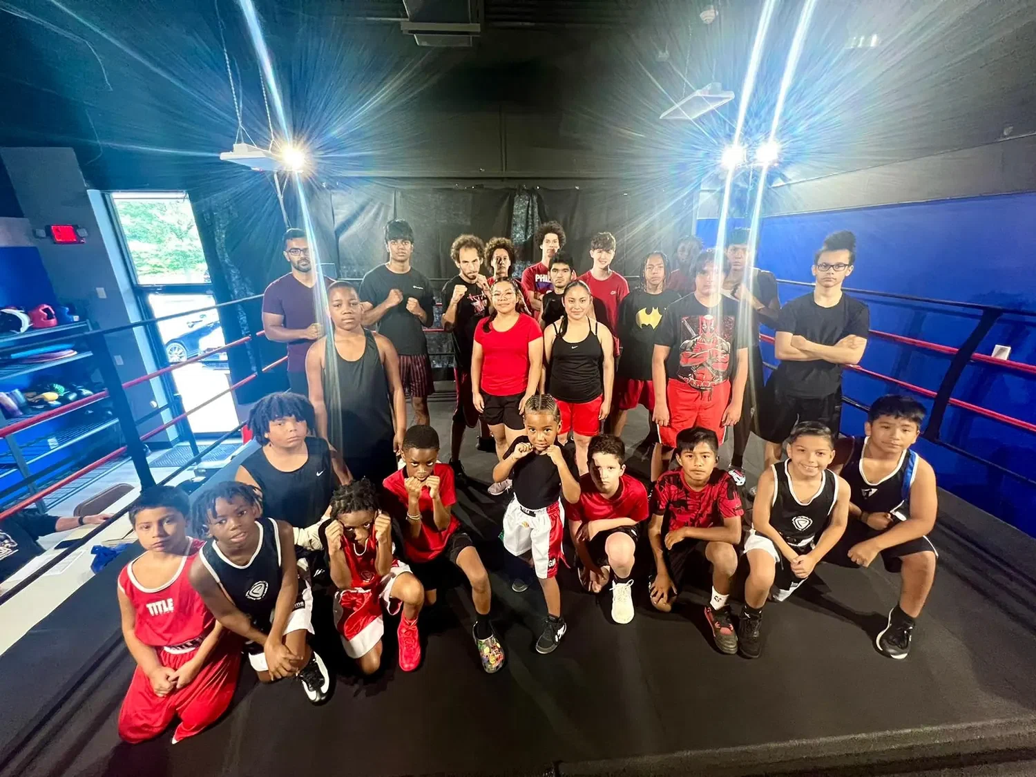 Primal youth boxing team group photo in the ring