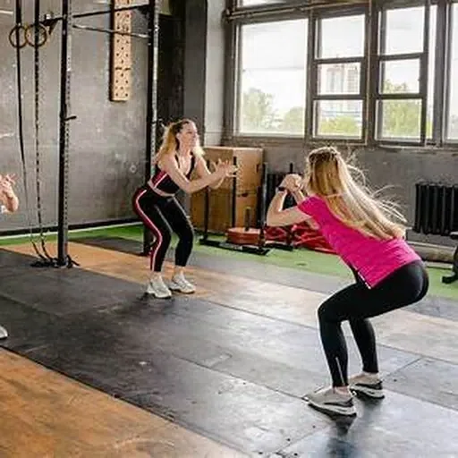 Bodyweight squat training stock photo